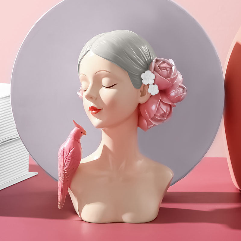 Sculpture décorative buste féminin avec oiseau en résine rose, objet déco poétique