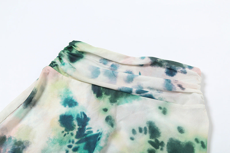 Close-up of the tie & dye fabric of the Naïa two-piece set, showcasing the vibrant colors and soft texture.