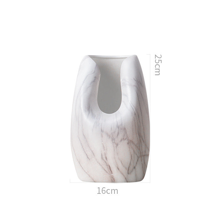 Vase en céramique marbrée blanche