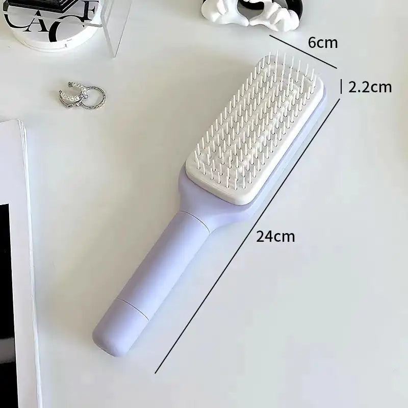 Brosse à cheveux antistatique autonettoyante